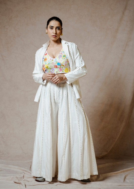 Noor Cream colored Scallop Appliquéd Blazer and Flared Pant Set.