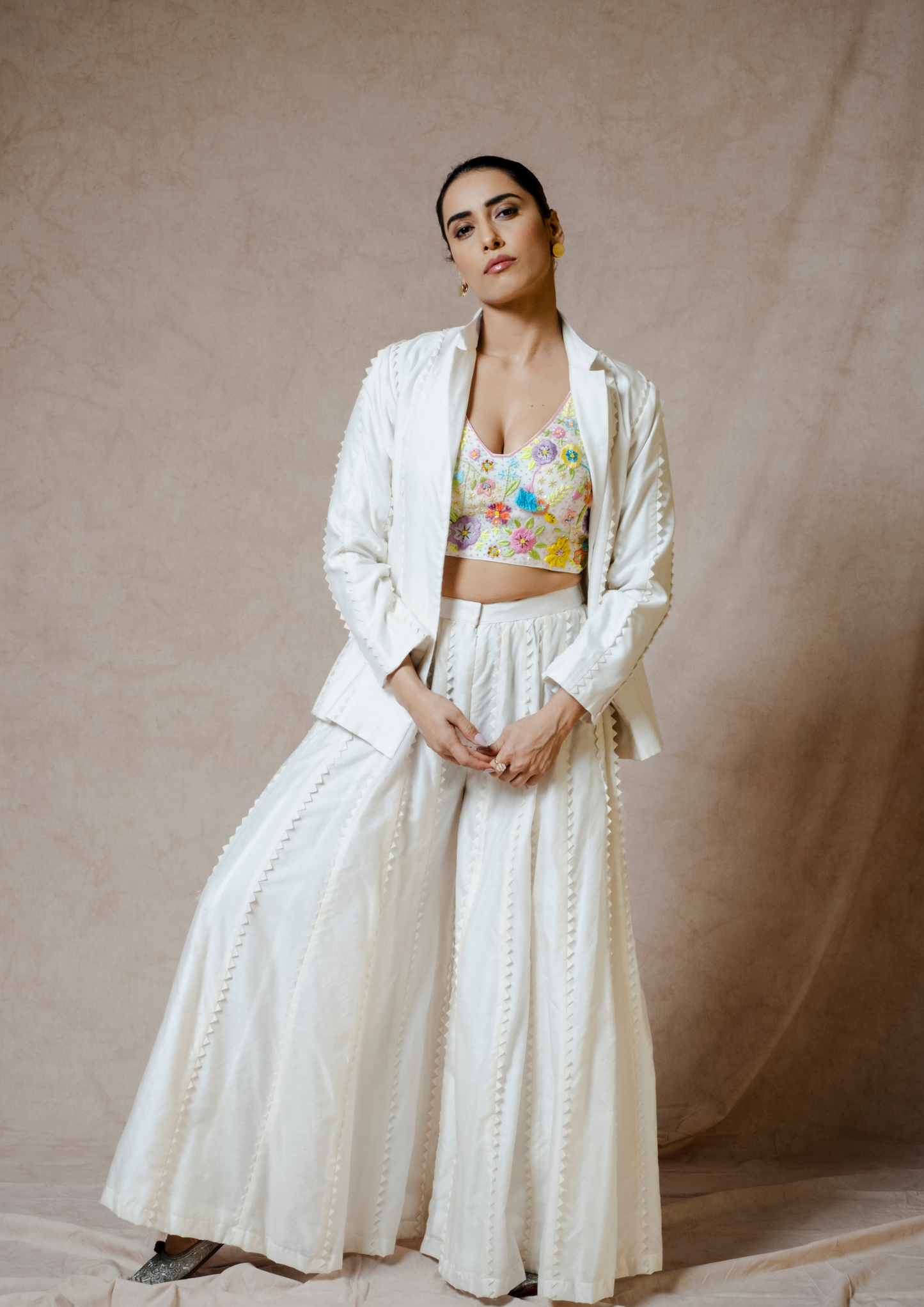 Noor Cream colored Scallop Appliquéd Blazer and Flared Pant Set.