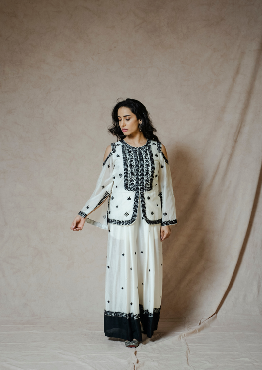 Akira Black and White Jumpsuit and Jacket Set.