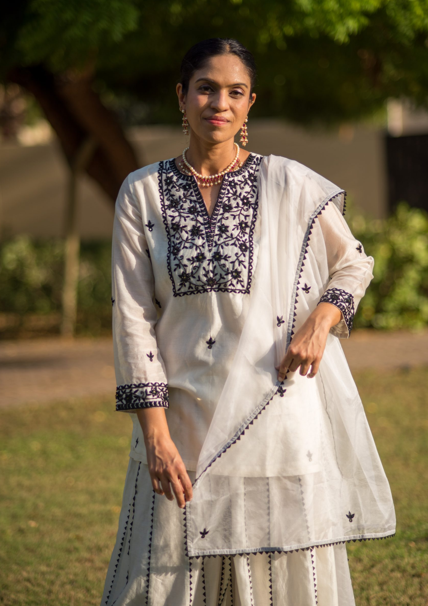 Akira Mayra Black and White Palazzo Kurta Set.