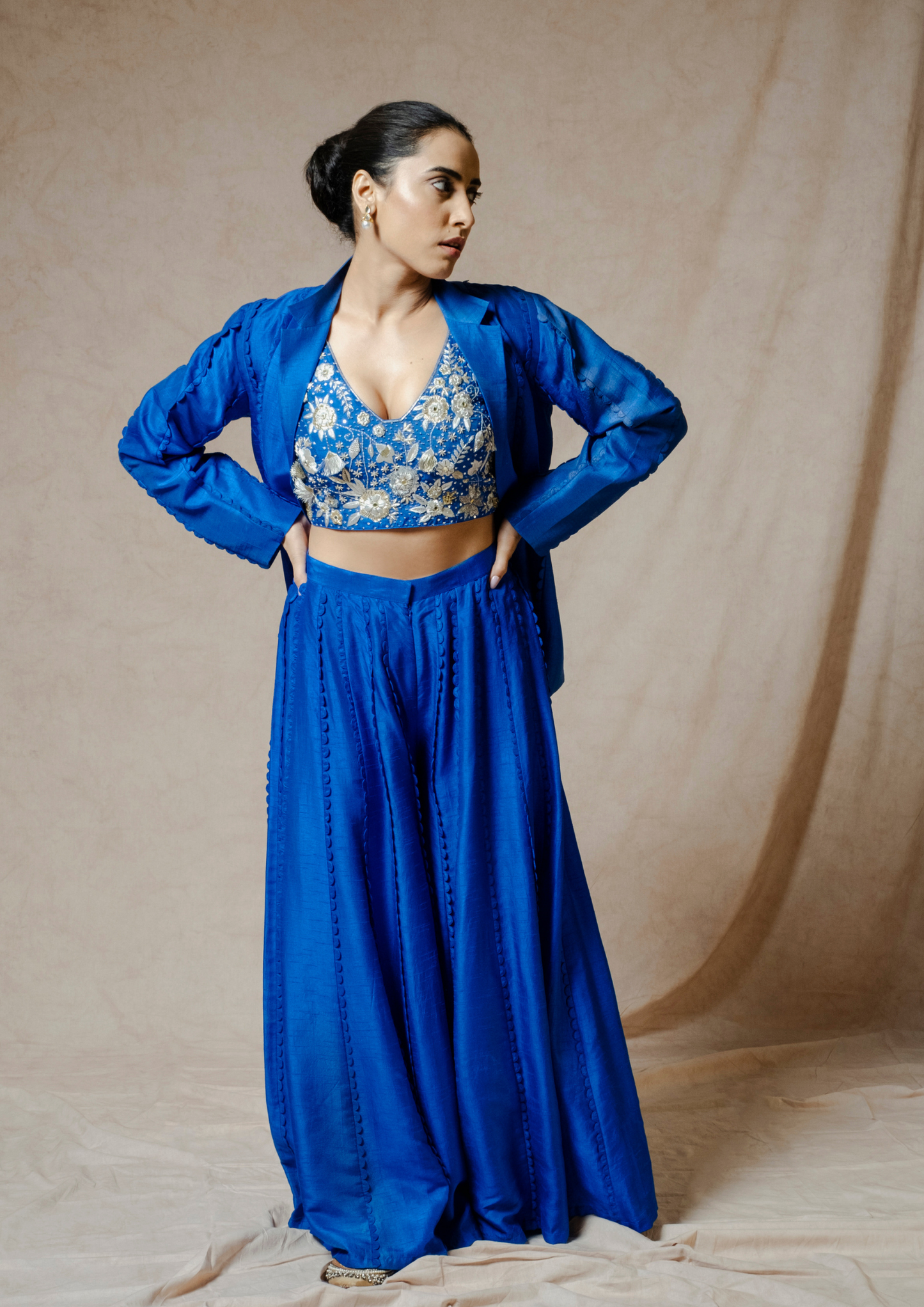 Noor Royal Blue colored Scallop Appliquéd Blazer and Flared Pant Set.