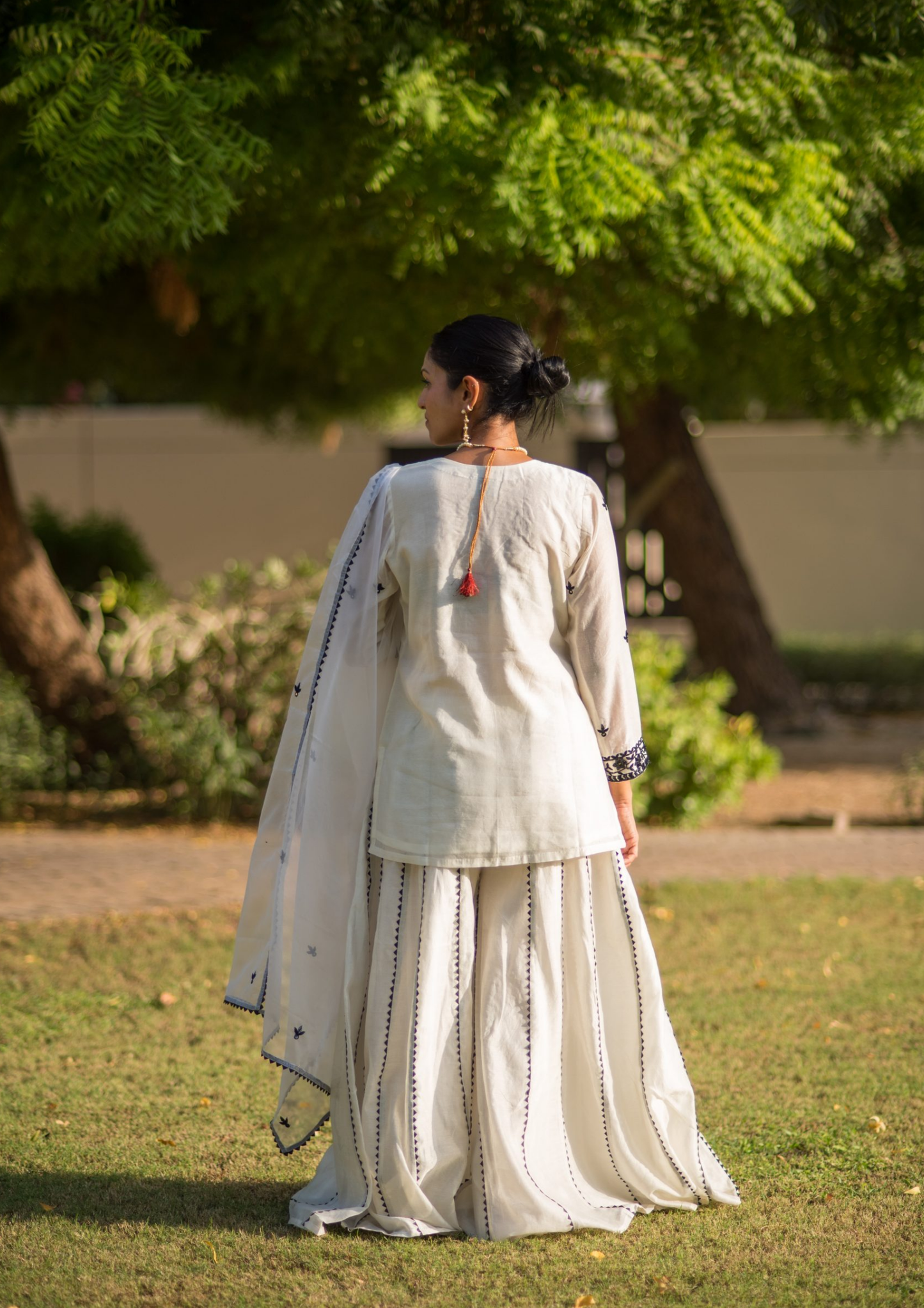 Akira Mayra Black and White Palazzo Kurta Set.