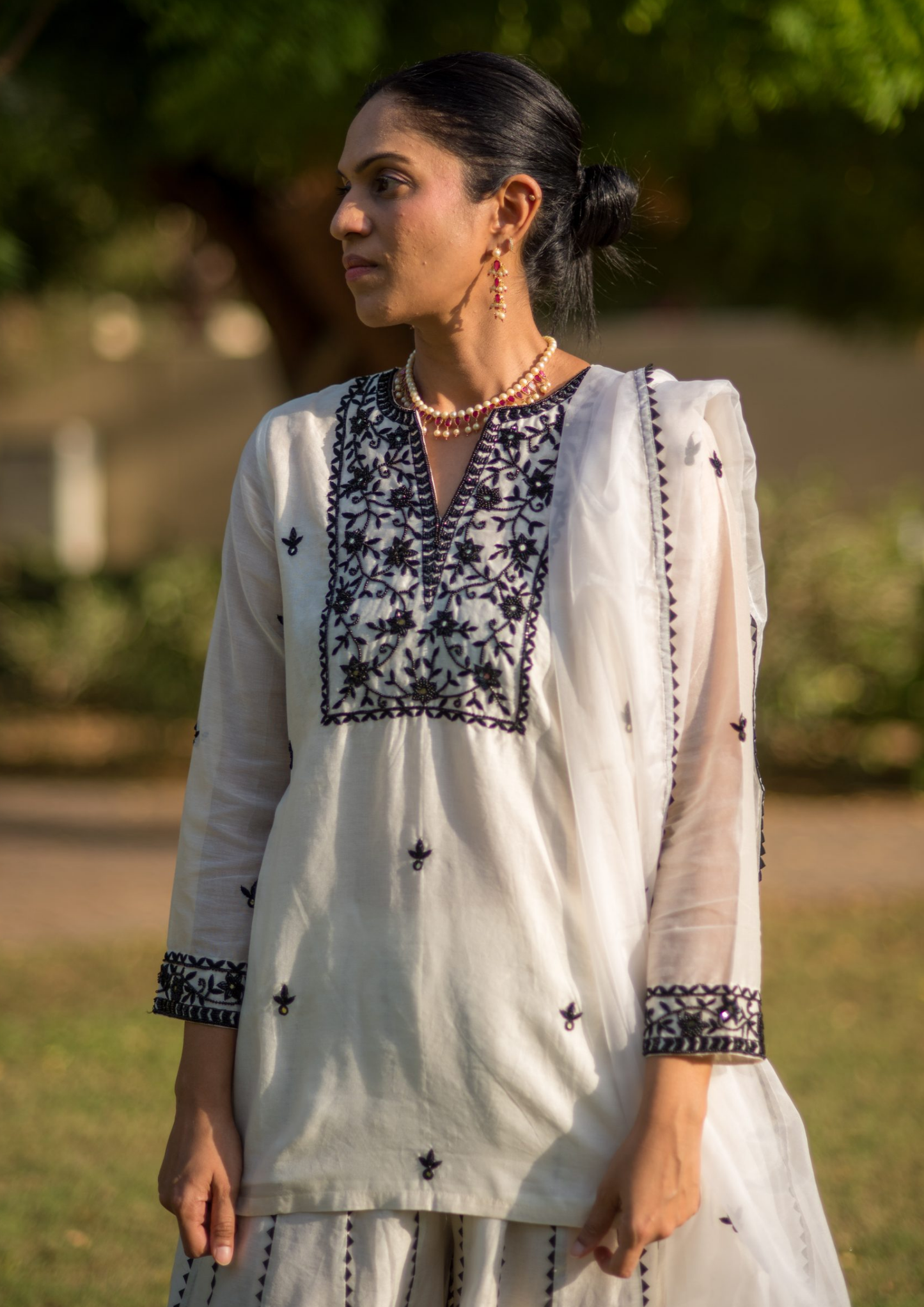 Akira Mayra Black and White Palazzo Kurta Set.
